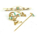 A yellow metal brooch set with turquoise cabochons and graduated seed pearls in the form of a