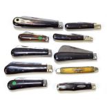 A collection of various horn bodied predominantly single bladed pen knives including examples by