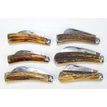 A collection of six antler bodied single bladed pen knives including examples by Joseph Rodgers &