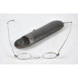 A leather cased pair of early Victorian hallmarked silver folding spectacles, width 10.6cm.