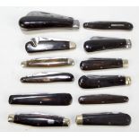 A collection of twelve predominantly late 19th/early 20th century horn bodied pen knives including