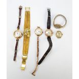 A group of vintage wristwatches comprising a 15ct yellow gold cased example,