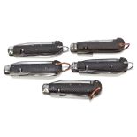 Five military clasp knives with moulded checkered pattern bodies with single blade,