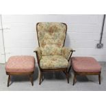 An Ercol, Evergreen 913, high-back winged armchair with two matching extension stools,