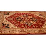 A red ground Heriz carpet, 280 x 200cm.