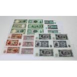 A collection of four 50 pesos banknotes with consecutive serial numbers;