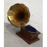 A reproduction 'His Masters Voice' wind-up gramophone.