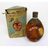 A boxed bottle of Haig's 'Dimple Scot's Scotch Whisky'.