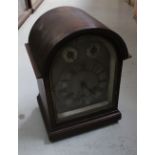 Gustave Becker; a late Victorian mahogany-cased dome-topped Medaille D'Or mantel clock,