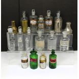 Two c1900 travelling apothecary bottles in metal cases, two c1900 green 'Poisons' bottles,