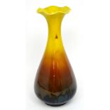 Attributed to Bretby; a tall yellow and brown trumpet top vase, height 31cm.