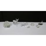 A collection of boxed Swarovski crystal animals to include buffalo, two frogs, hedgehog,