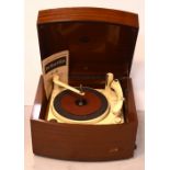 A mid-20th century mahogany-cased Pye Black Box record player.