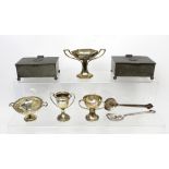 Four George V hallmarked silver trophies of varying sizes and form awarded for motoring