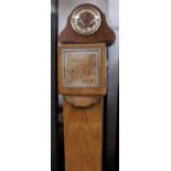 An Art Deco walnut grandmother clock, height 168cm, also a walnut mantel clock case (2).