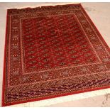 A red ground Bokhara rug, 190 x 140cm.