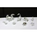 A collection of boxed Swarovski crystal animals to include turtle, goose, dog, hedgehog, squirrel,