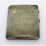 A George VI hallmarked silver engine-turned cigarette case, Birmingham 1941, approx 4.7ozt.