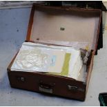 A vintage suitcase containing a large quantity of vintage, mainly Edwardian and 1920s onwards,