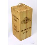 A boxed Graham's port, late bottled in unopened wooden box.