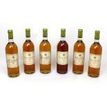 Six bottles of Château Roumieu Sauternes 1983 dessert wine,