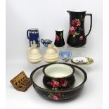 A pair of Crown Ducal 1930s cases, a large black ground wash bowl with matching jug and vase,