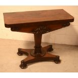 An early Victorian rosewood card table with D-shaped fold-over swivel top, width 91.5cm.