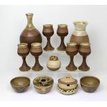 A quantity of contemporary stoneware to include a stoneware decanter and drinking glasses, vase,