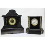A slate eight-day mantel clock with marble inlay, white dial set with Roman numerals,