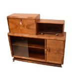 An Art Deco style walnut bureau/bookcase, width 120cm.