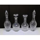 A pair of Stuart Crystal cut glass decanters (one boxed) and a further pair of Webb cut glass