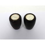 Two leather-bound and silver-topped gear stick mounts/handles, one inscribed 'Hadyn',