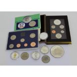 A collection of commemorative coinage to include '1983 Olympic Prestige' set, '1982 GB Proof' set,