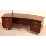 A rosewood-effect curved office desk by 'President Office Furniture', chrome handles and feet.