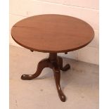 A 19th century mahogany tilt-top occasional table on tripod supports,