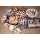 An early-to-mid 20th century Imari palette teapot, tureen, meat plates etc.