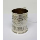 A Victorian hallmarked silver Christening mug of tapered circular form with two reeded bands and