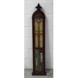 A late Victorian carved walnut 'Admiral Fitzroy's Barometer', height 117.5cm.