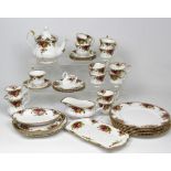 A Royal Albert 'Old Country Roses' part tea service to include teapot, milk jug etc.