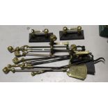 A quantity of brass and metalware to include hand irons, companion set etc.