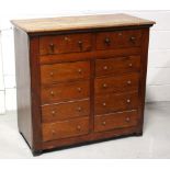 An early 20th century teak ship's chest with ten drawers, width 86cm.