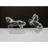 Two boxed Swarovski crystal horses (2).