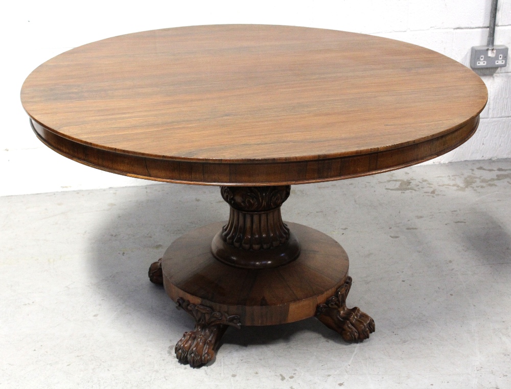 An early 19th century rosewood breakfast table,