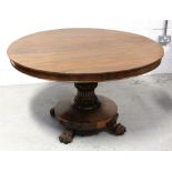An early 19th century rosewood breakfast table,