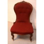 A Victorian mahogany spoon-back ladies' chair.