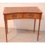 A reproduction yew inverted bow-front two-drawer side table, width 85cm.