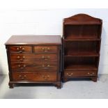 A 19th century two-over-three chest of drawers on ogee supports,