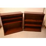 A pair of reproduction mahogany open bookcases,