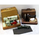 A vintage cased Singer sewing machine and a Jones no.B555738 wooden-cased sewing machine (2).