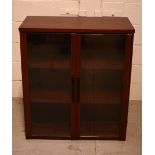 A rosewood-effect cabinet with two glazed doors, also a similar filing cabinet (2).